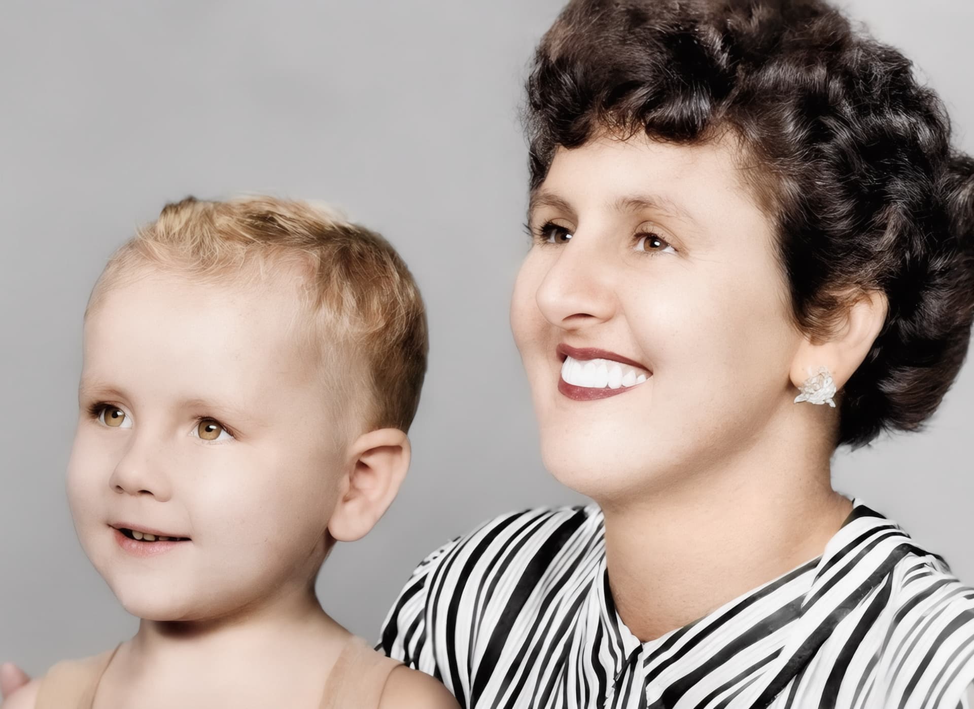 Restored photo after FixPix — With Mum — green cast removed and gently colourised