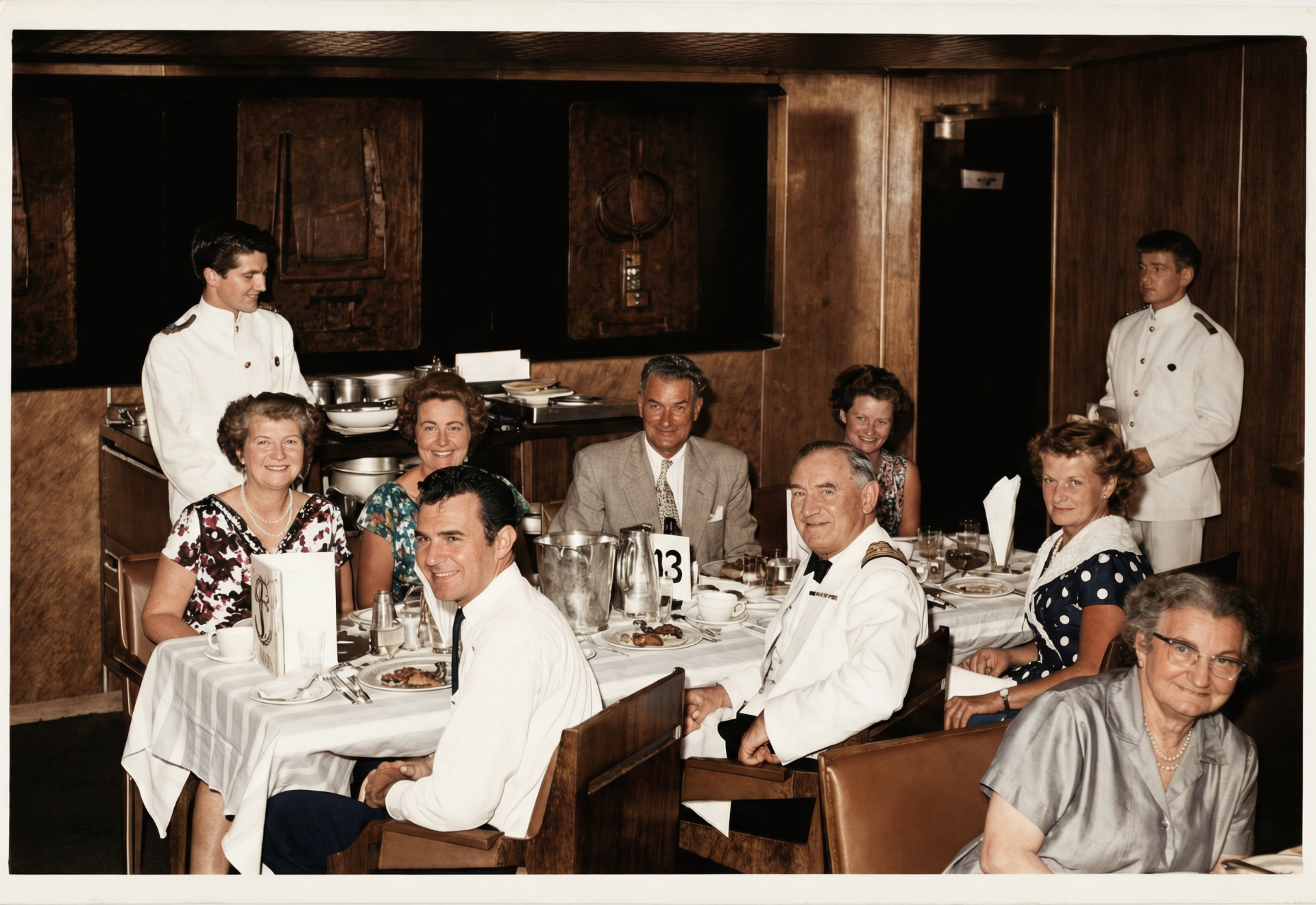 Restored photo after FixPix — Captain's table dinner — color brought back to life