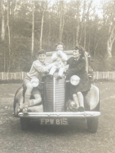 Original photo before FixPix restoration — Kids on the family car — sharpened and colorised
